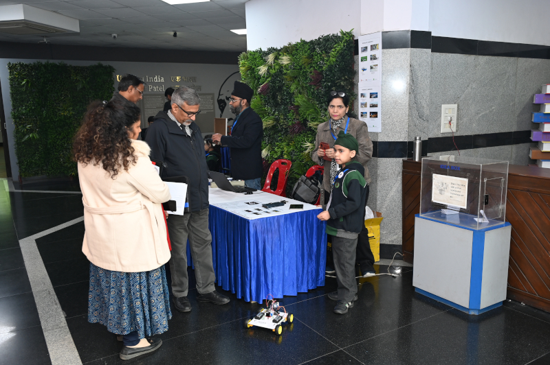 Judges inspecting the Robot's Performance